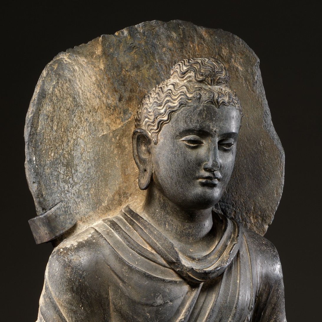 Buddha, 3rd century Pakistan, Khyber-Pakhtunkhwa province, Schist; H. 36 1/2 in. (92.7 cm); W. 11 in. (27.9 cm); D. 5 1/2 in. (14 cm) The Metropolitan Museum of Art, New York, Purchase, Denise and Andrew Saul Gift, in honor of Maxwell K. Hearn, 2014 (2014.188) http://www.metmuseum.org/Collections/search-the-collections/646117